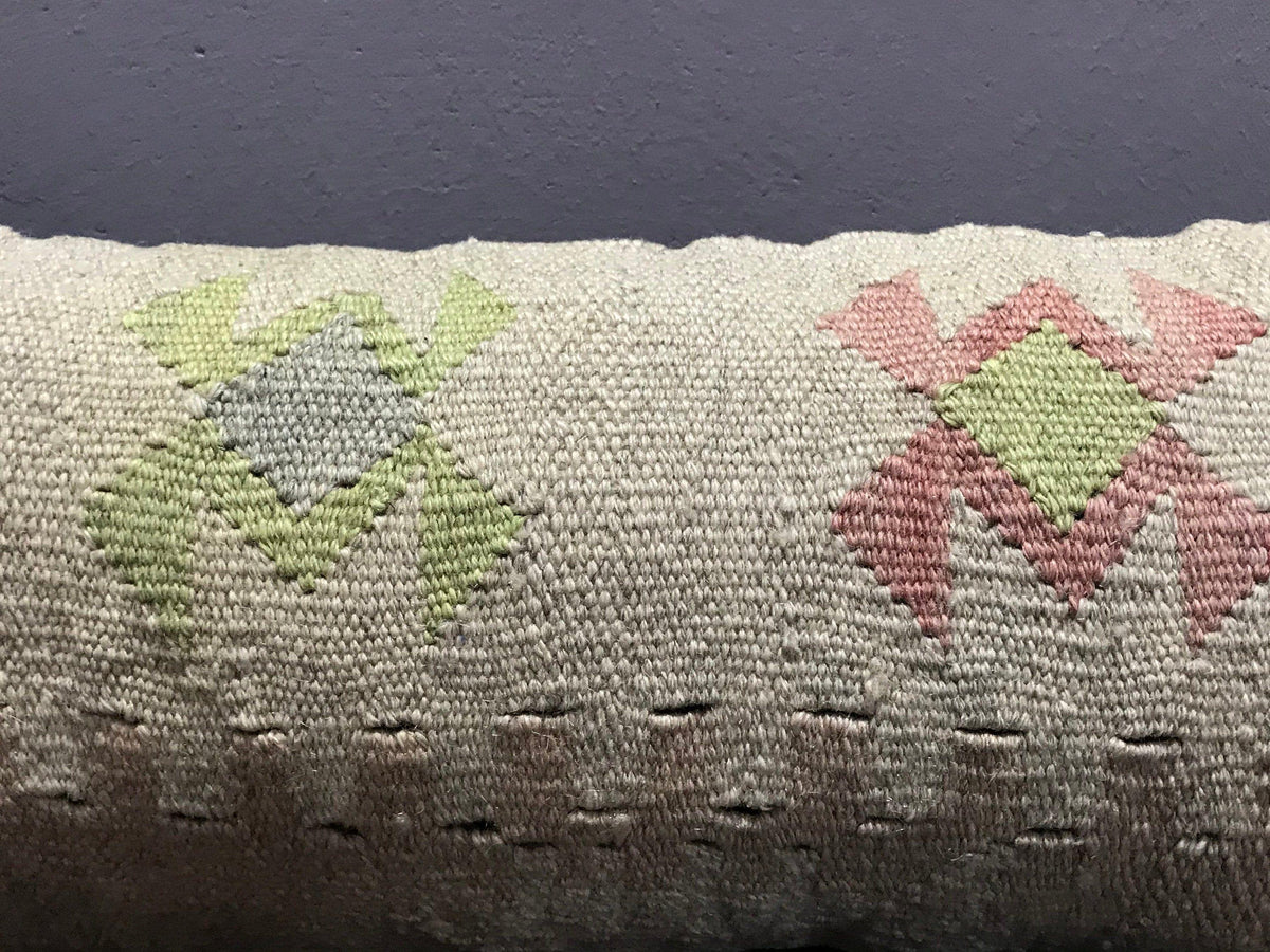 Close-up of the colorful Turkish pillow cover showing traditional details, low pile.