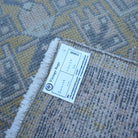 Pink 2' x 4' Turkish small anatolian rug from the 1970s with traditional design.