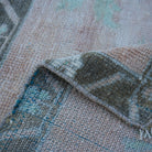 Additional view of the pale orange Turkish small square rug, hand-knotted in wool and cotton.