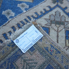 Blue 2' x 3' small turkish rug from the 1970s with traditional design.