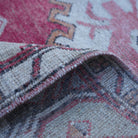 Additional view of the red small turkish rug, hand-knotted in wool and cotton.