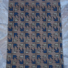 Close-up of the pale pink small turkish rug showing traditional details, hand-knotted weave, wool and low pile.