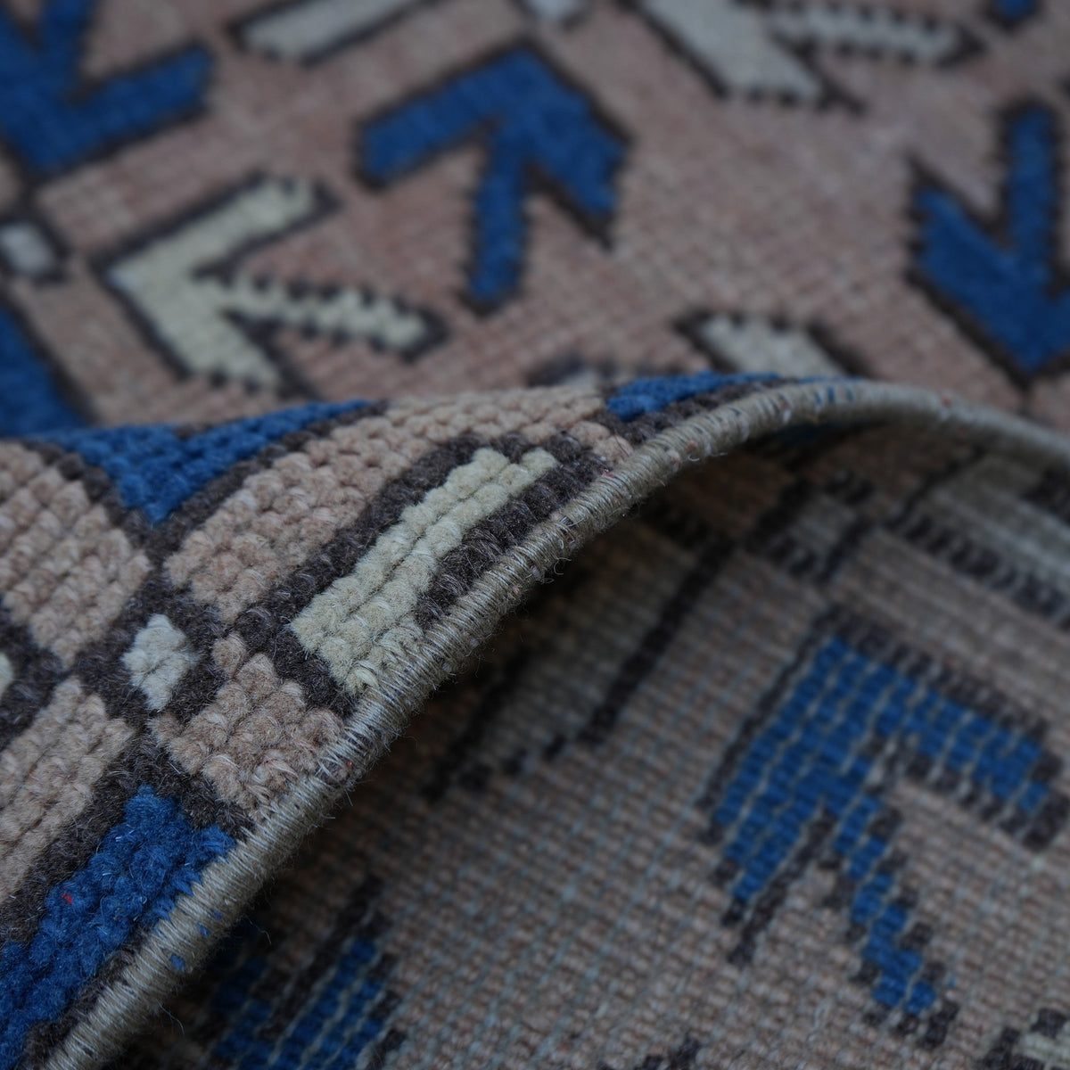 Additional view of the pale pink small turkish rug, hand-knotted in wool.