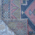 1970s pink small turkish rug with traditional design, hand-knotted weave and low pile.
