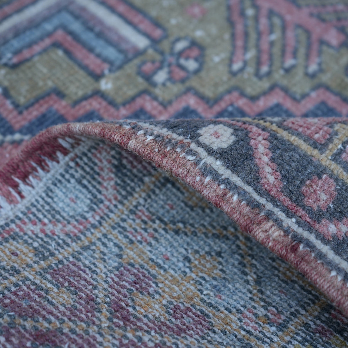 Additional view of the pink small turkish rug, hand-knotted in wool.