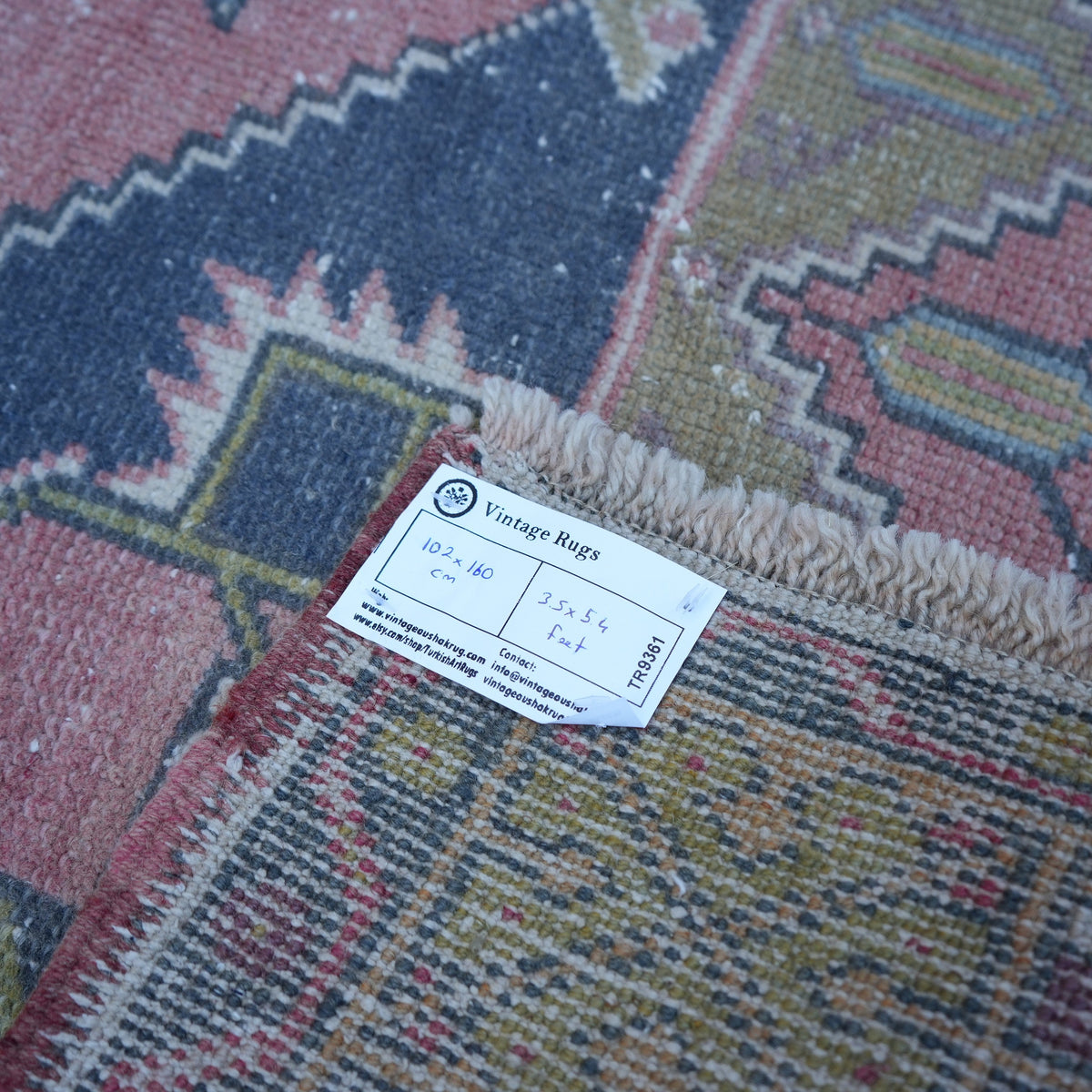 Pink 3' x 5' small turkish rug from the 1970s with traditional design.