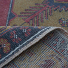 Additional view of the red small turkish rug, hand-knotted in wool.