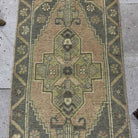 1970s gray Turkish small vintage rug with traditional design, hand-knotted weave and low pile.
