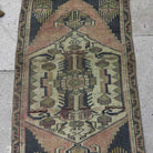1970s navy blue Turkish small vintage rug with traditional design, hand-knotted weave and low pile.