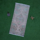 Pink 2' x 3' small vintage rug with traditional design, handmade in Turkey – Doralyn.