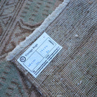 Pink 2' x 3' Turkish small vintage rug from the 1970s with traditional design.