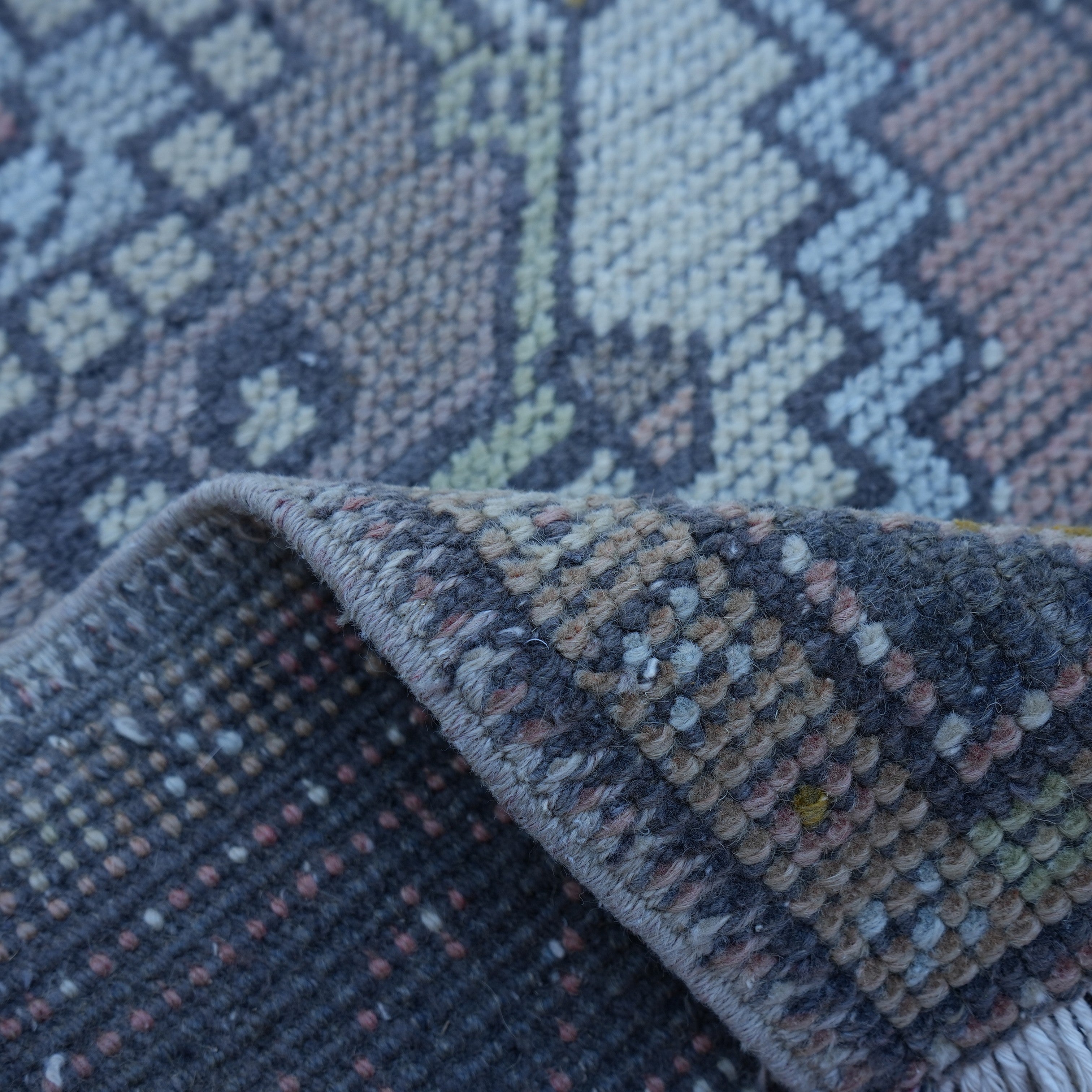 Additional view of the pink Turkish small vintage rug, hand-knotted in wool and cotton.