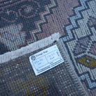 Pink 2' x 3' Turkish small vintage rug from the 1970s with traditional design.