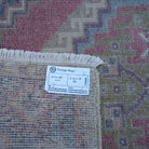 Red 2' x 3' Turkish small vintage rug from the 1970s with traditional design.