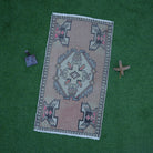 Red 2' x 3' small vintage rug with traditional design, handmade in Turkey – Raina.