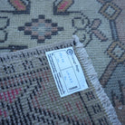 Red 2' x 3' Turkish small vintage rug from the 1970s with traditional design.