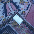 Pink 2' x 4' Turkish small vintage rug from the 1970s with traditional design.