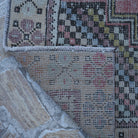 1970s pale red Turkish small vintage rug with traditional design, hand-knotted weave and low pile.
