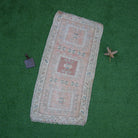 Pale Orange 2' x 4' small wool rug with neutral design, handmade in Turkey – Rosene.