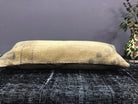 Close-up of the beige Turkish throw pillow showing traditional details, low pile.