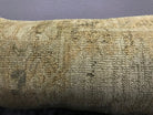 Close-up of the beige Turkish throw pillow showing traditional details, low pile.