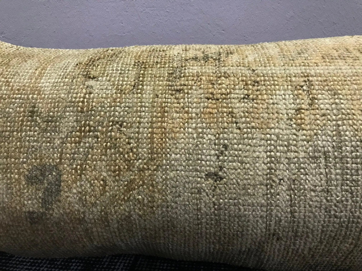 Close-up of the beige Turkish throw pillow showing traditional details, low pile.