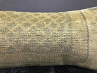 Close-up of the beige Turkish throw pillow showing traditional details, low pile.