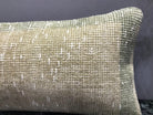 1970s beige Turkish throw pillow with neutral design, low pile.