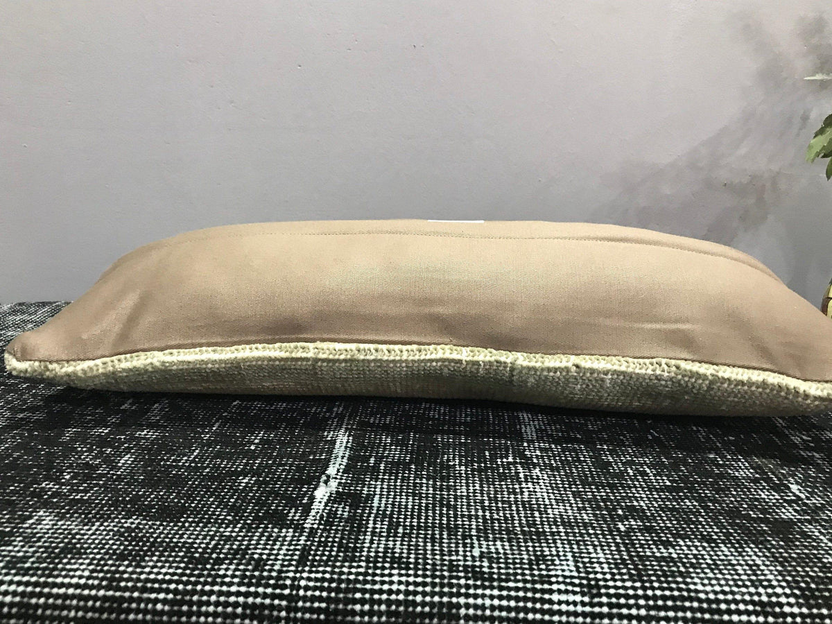 Additional view of the beige Turkish throw pillow.