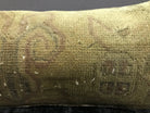Close-up of the beige Turkish throw pillow showing neutral details, low pile.