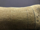 Close-up of the beige Turkish throw pillow showing traditional details, low pile.