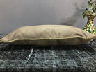 Close-up of the beige Turkish throw pillow showing traditional details, low pile.