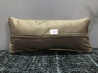 Beige Turkish throw pillow, shown on the floor.