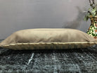 Close-up of the beige Turkish throw pillow showing traditional details, low pile.
