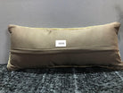 Beige Turkish throw pillow, shown on the floor.