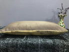 Beige Turkish throw pillow, shown on the floor.