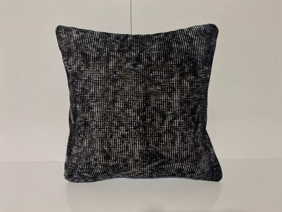 Black throw pillow with overdyed design, handmade in Turkey – KK00173.