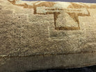 Close-up of the brown Turkish throw pillow showing neutral details, low pile.