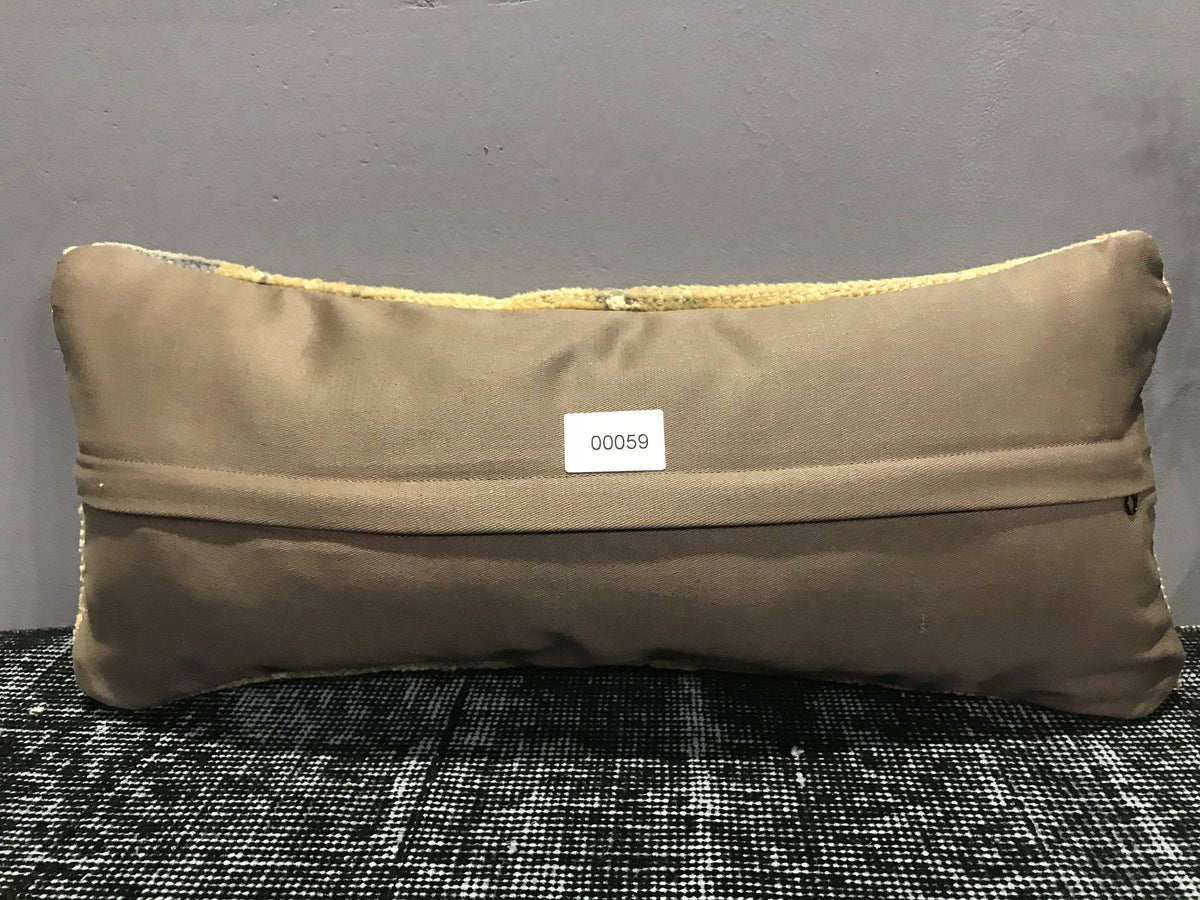 Colorful Turkish throw pillow, shown on the floor.