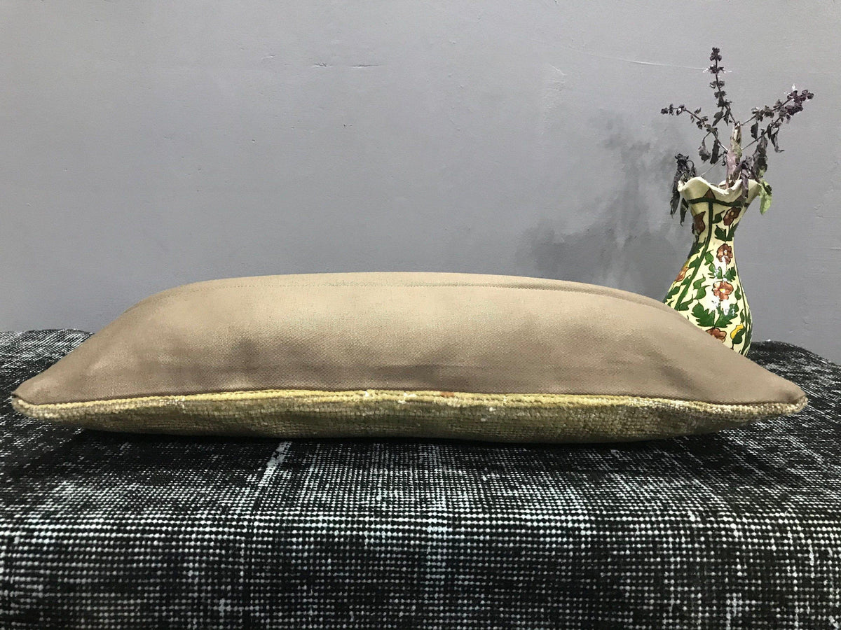 Close-up of the colorful Turkish throw pillow showing traditional details, low pile.