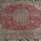 1970s red Turkish traditional anatolian rug with traditional design, hand-knotted weave and low pile.