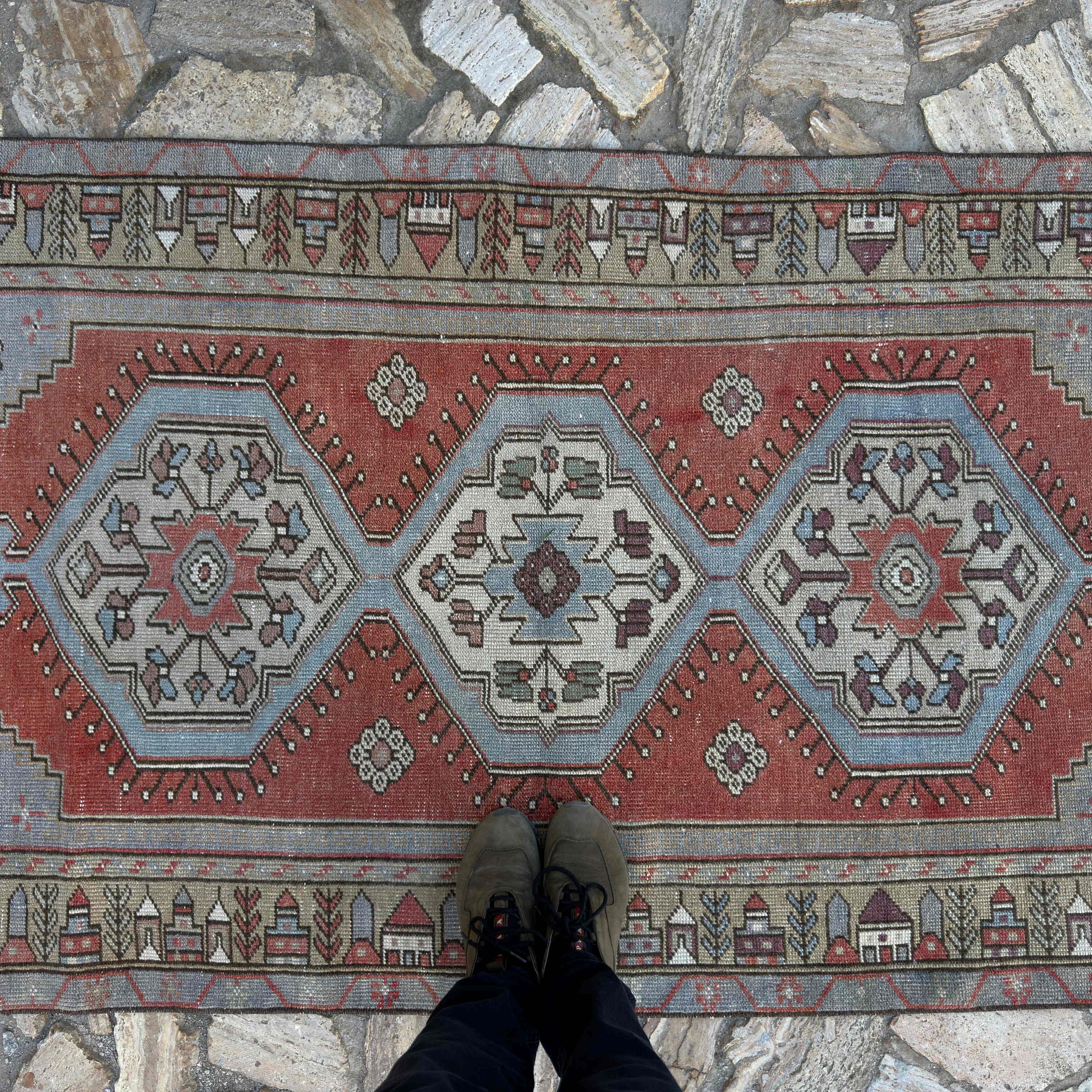 1970s red Turkish traditional rug with traditional design, hand-knotted weave and low pile.