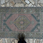 1970s pink traditional turkish rug, hand-knotted weave and low pile.