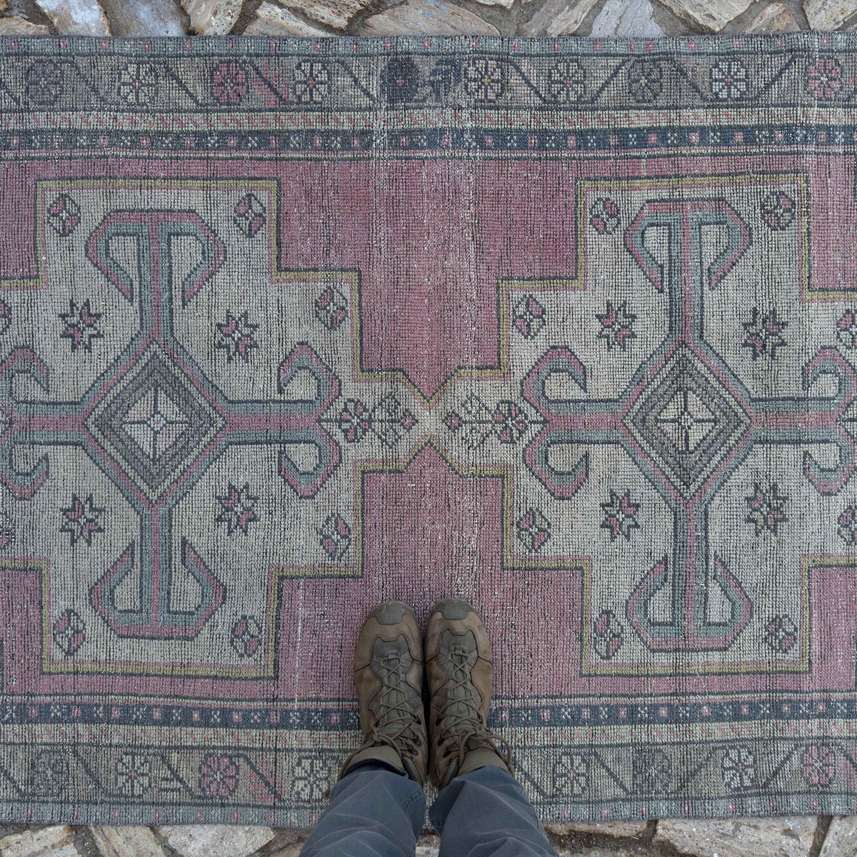 1970s pink traditional turkish rug with traditional design, hand-knotted weave and low pile.
