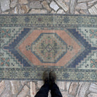 1970s orange Turkish traditional vintage rug with traditional design, hand-knotted weave and low pile.