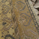 Close-up of the yellow Turkish traditional wool rug showing neutral details, hand-knotted weave, wool and cotton and low pile.