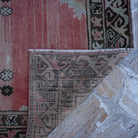 1970s red turkish area rug, hand-knotted weave and low pile.