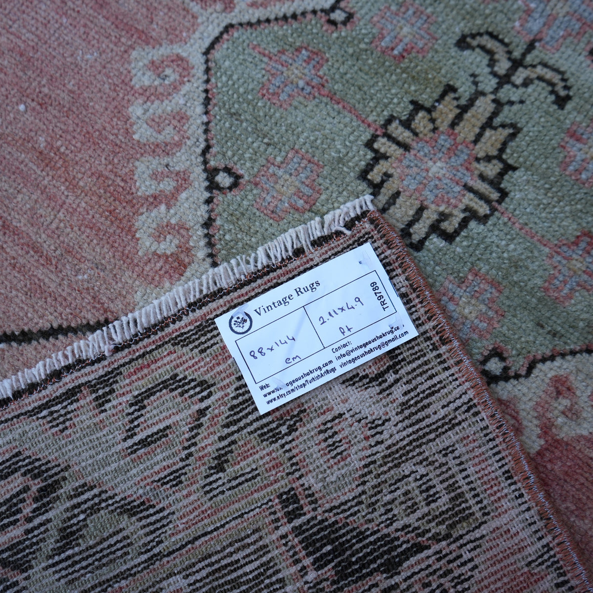 Red 3' x 5' turkish area rug from the 1970s.