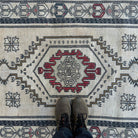 1970s red turkish geometric rug with traditional design, hand-knotted weave and low pile.