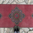 1970s red turkish geometric runner rug with traditional design, hand-knotted weave and low pile.